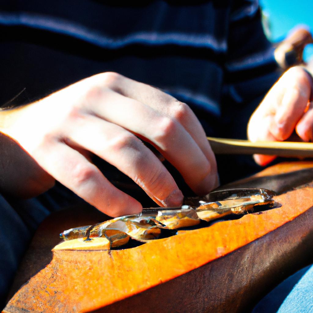 Person playing traditional Irish instrument