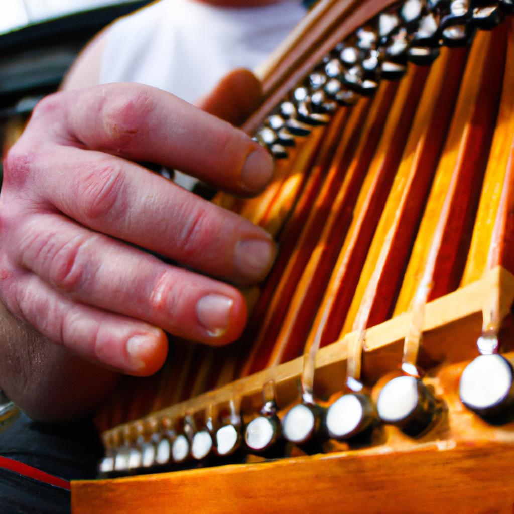 Person playing traditional Irish instrument