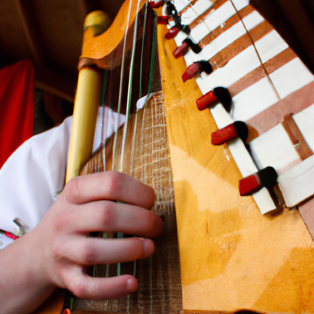 Person playing traditional Irish instrument