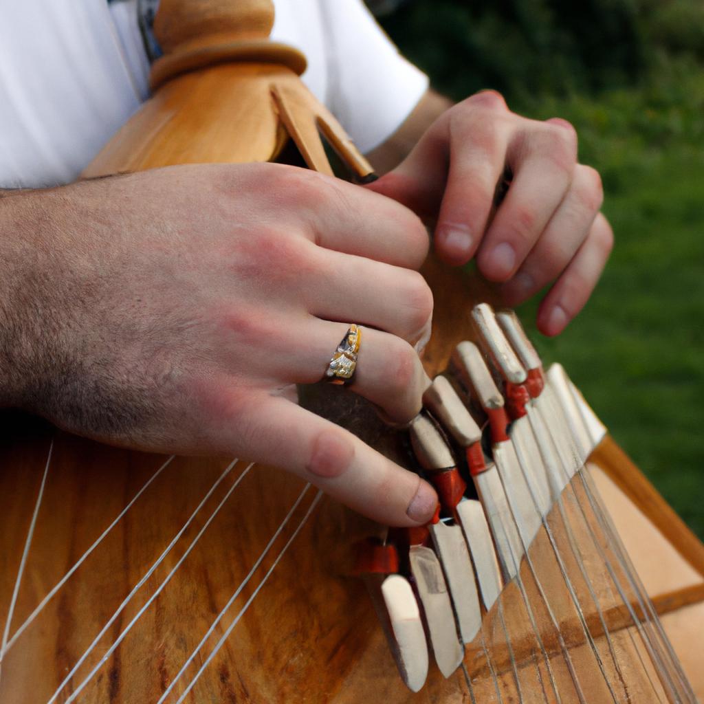 Person playing traditional Irish instrument