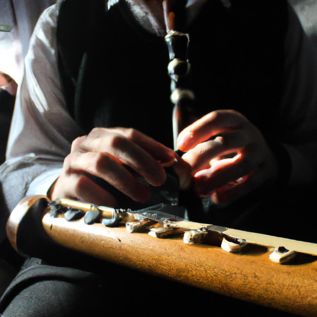 Person playing traditional Irish instrument