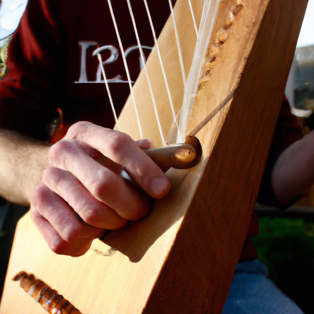 Person playing traditional Irish instrument